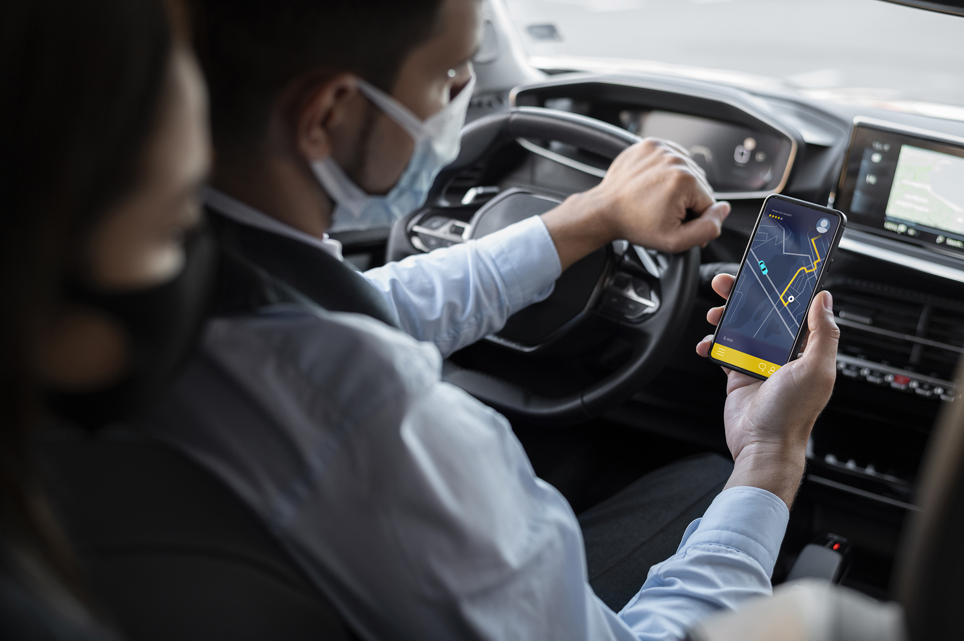 young-male-being-uber-driver-female-client